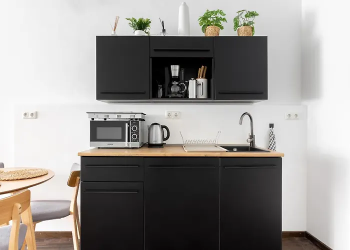 Global Living - Design I Rathausplatz I Kitchen I Apartman