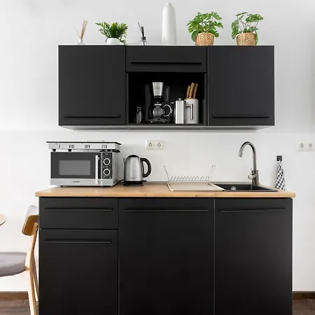 Global Living - Design I Rathausplatz I Kitchen I Appartamento